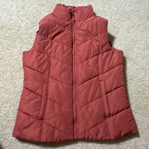 Reddish orange vest